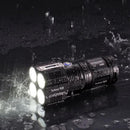 Nitecore gaismas lukturis TM28, 6000 lūmenu, 4 x IMR 18650 akumulatori, IPX-8, OLED displejs, statīvs, lādētājs