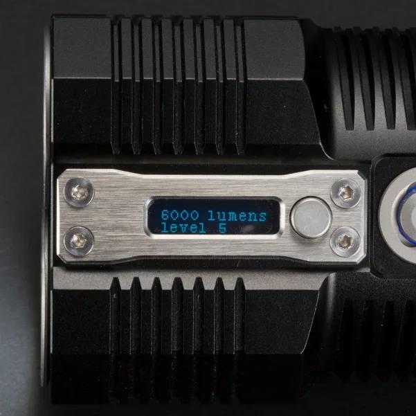 Nitecore gaismas lukturis TM28, 6000 lūmenu, 4 x IMR 18650 akumulatori, IPX-8, OLED displejs, statīvs, lādētājs