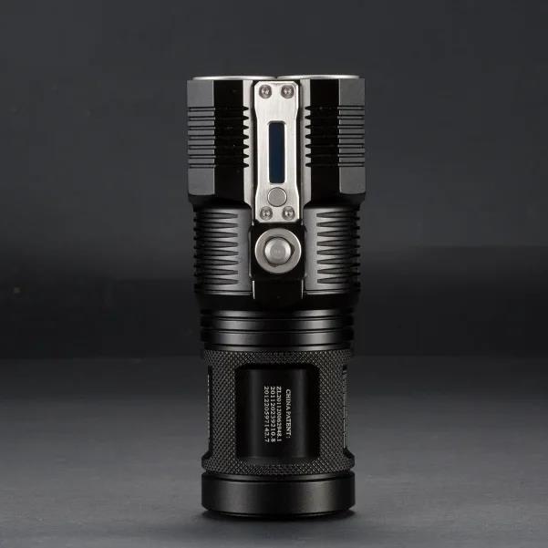 Nitecore gaismas lukturis TM28, 6000 lūmenu, 4 x IMR 18650 akumulatori, IPX-8, OLED displejs, statīvs, lādētājs