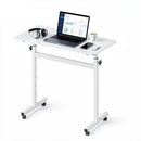 VEVOR mobilais sēdus-stāvus darba galds ar regulējamu augstumu, bloķējamiem riteņiem, āķi un 25 kg slodzi, 810 × 410 mm, balts
