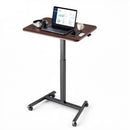 VEVOR mobilais sēdus-stāvus darba galds ar regulējamu augstumu, 4 riteņiem, āķi un 15 kg nestspēju, 650 × 480 mm, brūns