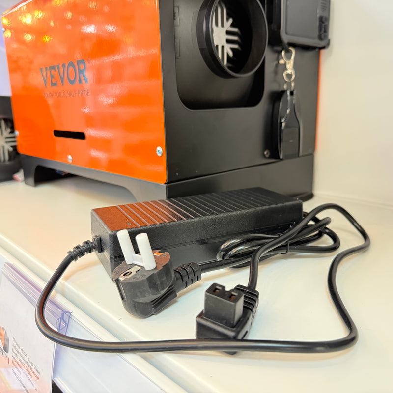 Pieejams no 1.novembra_Universāls 12V uz 220V 144W barošanas adapteris dīzeļsildītājiem (2-8kW). Der VEVOR, Planar, Autoterm, Warmtoo u.c. zīmoliem. Droša un stabila strāvas padeve.