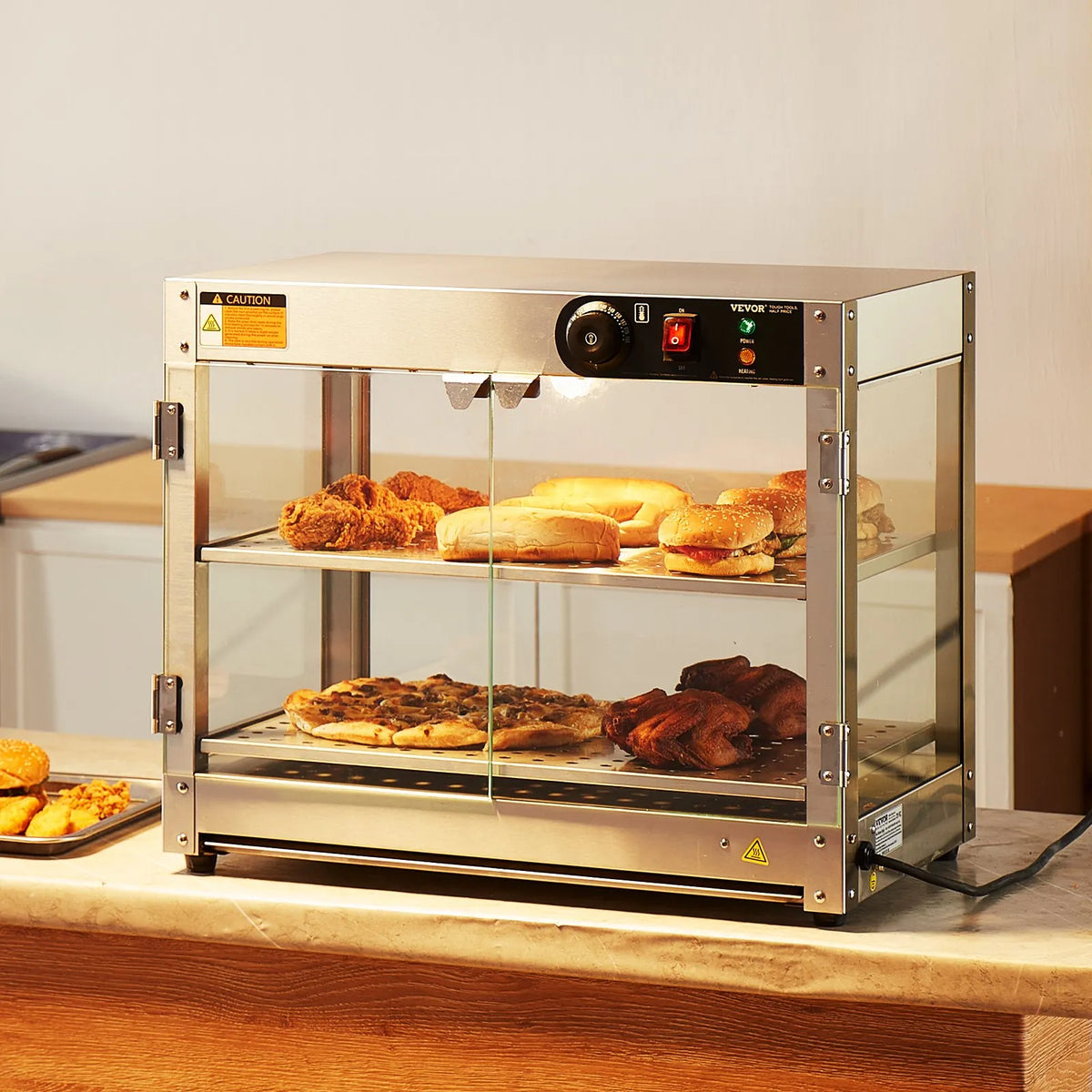 VEVOR 2 līmeņu komerciālā pārtikas sildīšanas vitrīna, 800 W pārtikas vitrīnas sildītājs ar apgaismojumu ēdiena izcelšanai, temperatūras kontrole 30–85 °C, 58 l ietilpība hamburgeriem, picai, maizei un ceptai vistas gaļai - ZEMLETES.LV