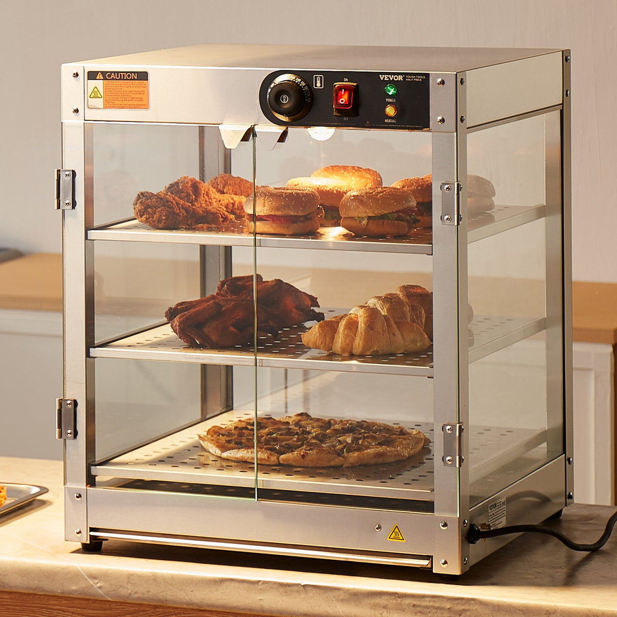VEVOR 3 līmeņu komerciālā pārtikas sildīšanas vitrīna, 800 W pārtikas vitrīnas sildītājs ar apgaismojumu ēdiena izcelšanai, temperatūras kontrole 30–85 °C, 90 l ietilpība hamburgeriem, picai, maizei un ceptai vistas gaļai - ZEMLETES.LV